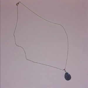 Navy blue stone necklace.